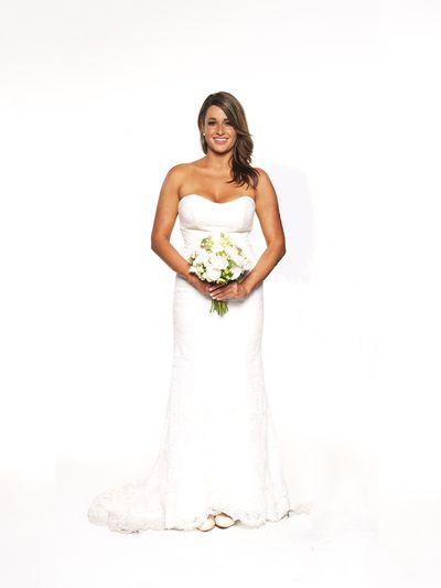 This <a href="http://dressense.com.au/product/allure-bridals-2903/" target="_blank">Allure gown</a> featured a strapless fitted bodice in creamy white which showed off Lauren Bran's beautiful tanned figure. Sweet ballet flats completed her look. Might they be good for running in?