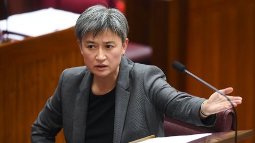 Labor Senator Penny Wong reacts during debate on the Nauru bill.