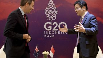 Australian Treasurer Jim Chalmers, left, talks with Singaporean Finance Minister Lawrence Wong during their bilateral meeting on the sidelines of the G20 Finance Ministers and Central Bank Governors Meeting in Nusa Dua, Bali.