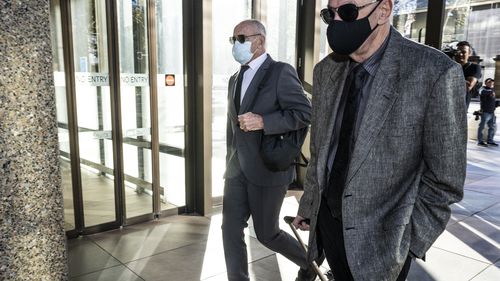 Chris Dawson with his twin brother Paul Dawson (right) arrive at the NSW Supreme Court on Wednesday May 18.