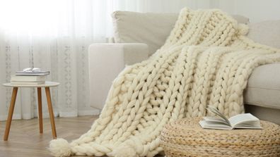 Chunky knit throw on a couch