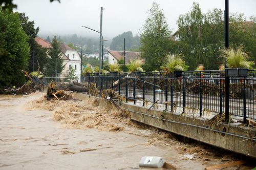 Fallen trees and branches are seen on a road during floods in Medvode, Slovenia, August 4, 2023. REUTERS/Borut Zivulovic