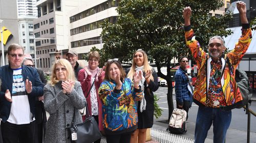 Supporters of Gary Jubelin, including Mark and Faye Leveson, applauded as the former detective arrived at court.