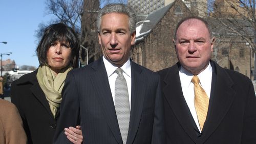 In this March 4, 2005 file photo, Charles B. Kushner, flanked by his wife, Seryl Beth, left, and his attorney Alfred DeCotiis arrives at the Newark Federal Court for sentencing in Newark, N.J. 