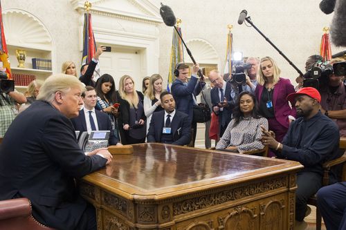 Trump conducts a bizarre audience with the rapper Kanye West on Thursday in the Oval Office.