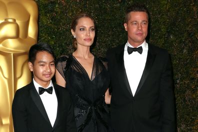 Maddox Jolie-Pitt with parents Angelina Jolie and Brad PItt at the Academy of Motion Picture Arts and Sciences' Governors Awards in November 2013.