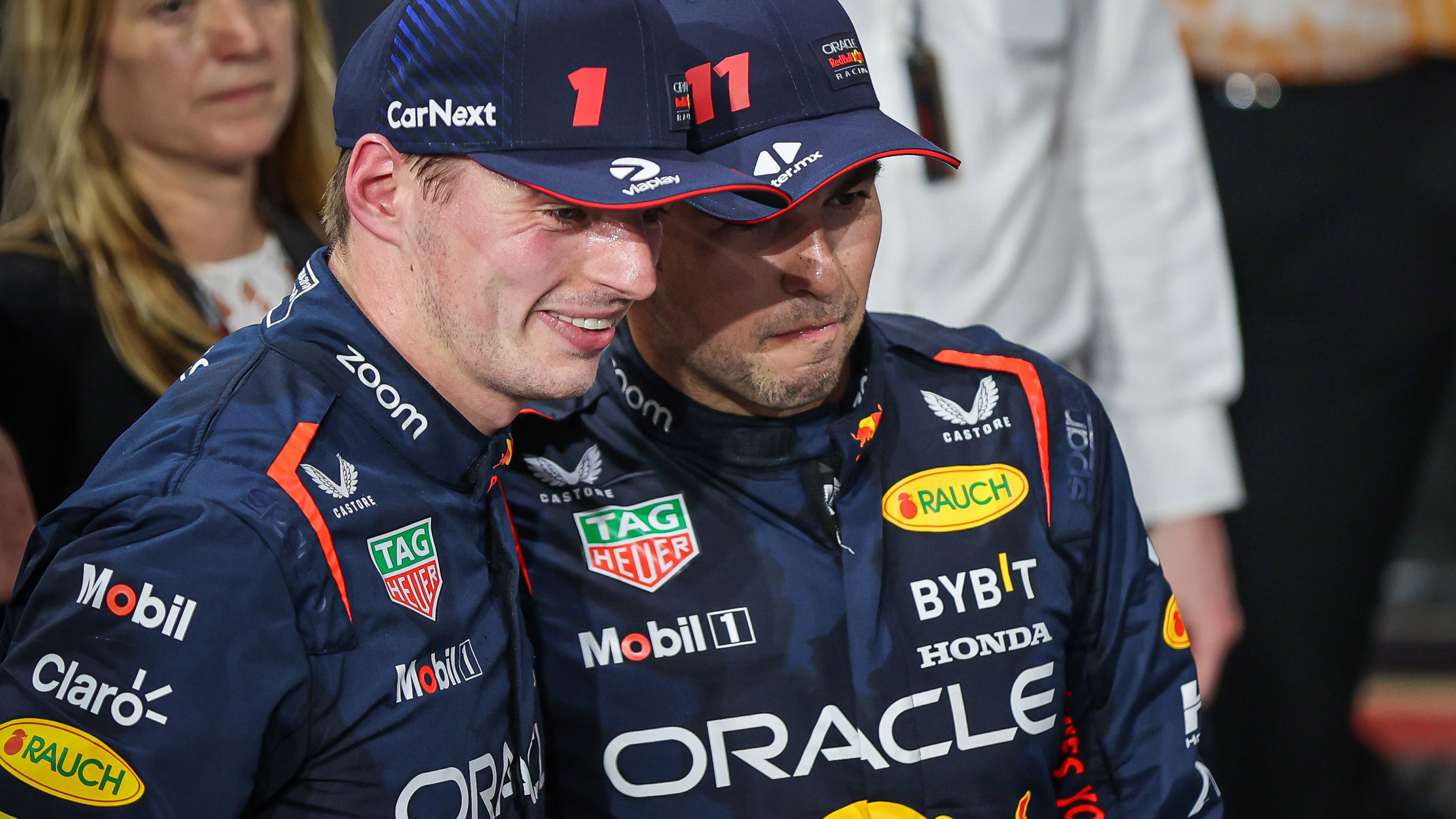 Race winner Sergio Perez (R) of Mexico and second placed Max Verstappen (L) of the Netherlands and Oracle Red Bull Racing celebrate after the F1 Grand Prix of Saudi Arabia at Jeddah Corniche Circuit on March 19, 2023 in Jeddah, Saudi Arabia. (Photo by Ayman Yaqoob/Anadolu Agency via Getty Images)