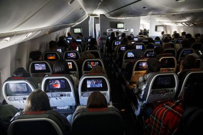 plane passengers row of seats