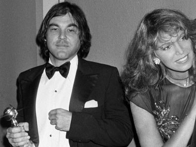 (L-R) Oliver Stone, Ann Turkel, and Richard Harris attend an awards ceremony at the Beverly Hills Hotel in Beverly Hills, California, on December 27, 1979.