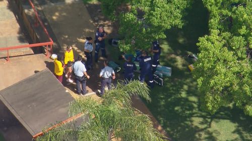 A young girl has been pulled unconscious from a swimming pool ﻿in Sydney's west in what paramedics have described as a "near drowning".