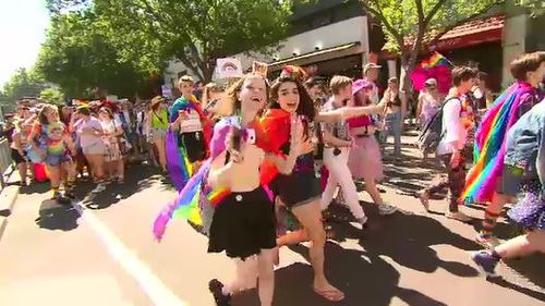 Thousands took to the street in a sea of colour. 