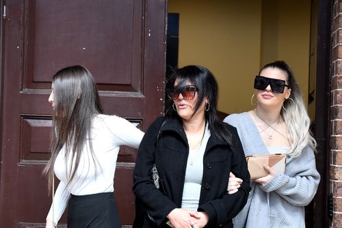 Bassil Hijazi's mother (centre) is seen with supporters outside the Supreme Court following the sentencing. (AAP)