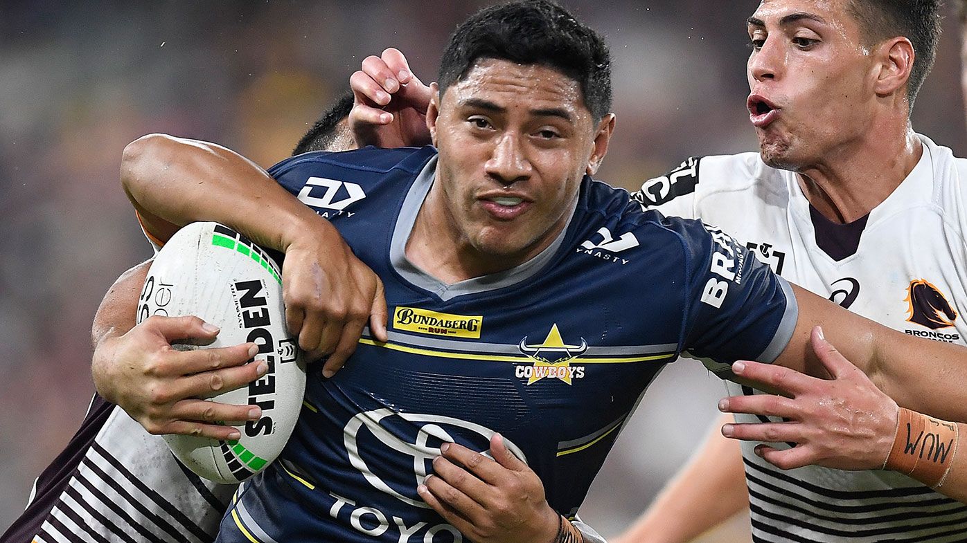 Jason Taumalolo of the Cowboys is tackled by Jordan Riki of the Broncos during the round nine NRL match between the North Queensland Cowboys and the Brisbane Broncos at QCB Stadium, on May 08, 2021, in Townsville, Australia. (Photo by Ian Hitchcock/Getty Images)