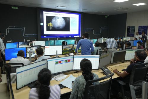 People watch the live telecast of the landing of Chandrayaan-3, at the Integrated Command Control Centre (ICCC) in Varanasi, India, Wednesday, August 23, 2023