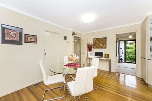 The Canberra housing market is more affordable than Sydney's. This house in 12 Pattinson Crescent, Flynn, is for sale for offers above $640,000. (Domain)