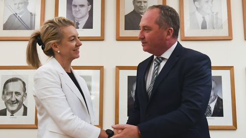 Natioanal Party leader Barnaby Joyce congratulations newly-elected deputy leader Bridget McKenzie on December 7 - who will also join the Cabinet. (AAP)