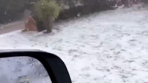 Port Macquarie was battered by heavy hail yesterday afternoon, with residents taking footage of what looked like a winter wonderland, days out from December.