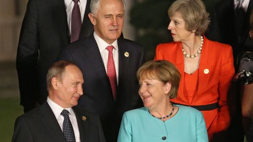 Russian President Vladimir Putin, German Chancellor Angela Merkel and Australian Prime Minister Malcolm Turnbull and British Prime Minister Theresa May. (AAP)