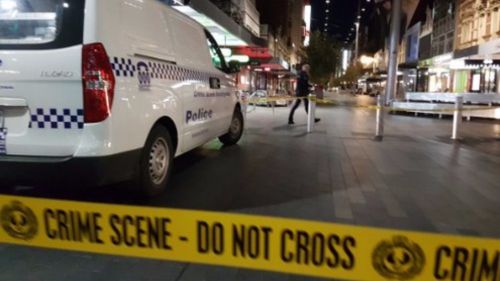 Man arrested over Adelaide CBD stabbings as victim fights for life