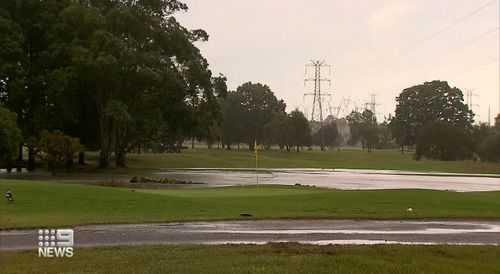 A man has been rushed to hospital after being struck by lightning on a golf course near Brisbane.