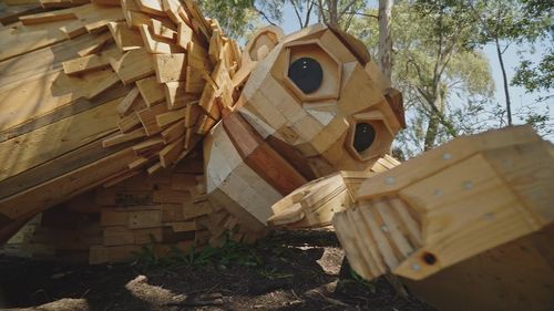A $25,000 reward is on offer to help solve an arson attack on a new artwork in Perth, which police have branded "disgusting and cowardly".One of the giant wooden creations that made up part of new attraction The Giants of Mandurah was torched by arsonists at 11.30pm on Friday.