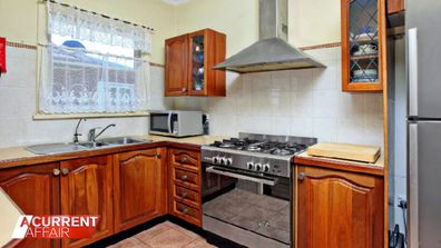 What the kitchen inside Quincy's western Sydney home once looked like.