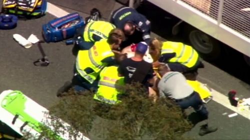 Man hit by truck 'while changing his tyre' on the Cunningham Highway in Yamanto, southeast Queensland