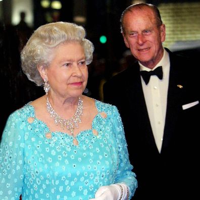 Britain's Queen Elizabeth II and the Duke of Edinburgh arrive for the Royal Variety Performance in 2001