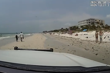 Bodycam video has been released showing a police officer helping a lost girl to find her family on a Florida beach.