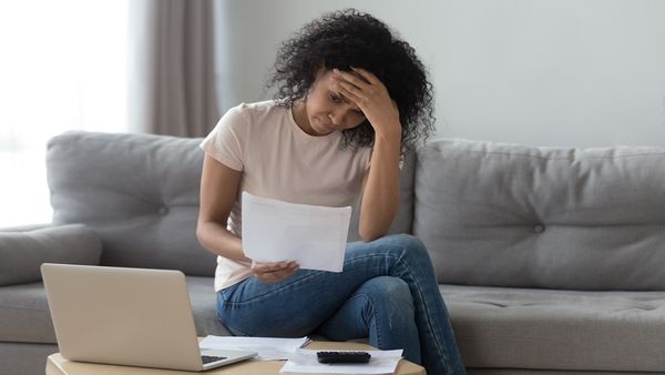 Woman reading financial statements