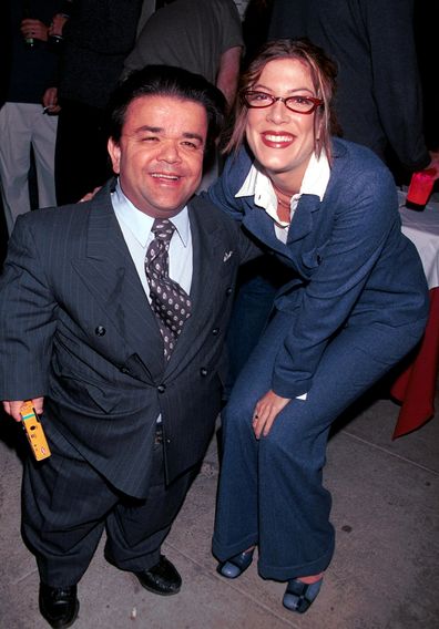 383417 12: Actress Tori Spelling, right, poses with actor Gary Friedkin during a party and final shoot for "Joe Head Goes Hollywood" December 17, 2000 in Venice, CA. (Photo by Newsmakers)