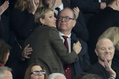 PARIS, FRANCE - OCTOBER 28: Princess Charlene of Monaco celebrates the victory by hugging Prince Albert II of Monaco at full time following the Rugby World Cup France 2023 Final between New Zealand (All Blacks) and South Africa (Springboks) at Stade de France on October 28, 2023 in Saint-Denis near Paris, France. (Photo by Jean Catuffe/Getty Images)