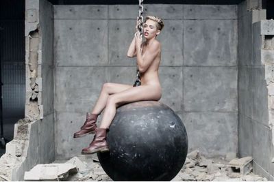 September 9: If we had known this was coming, we would've begged for nude PVC! In her clip for 'Wrecking Ball' Miley licks a sledgehammer while riding the destructive ball in her birthday suit... which has got to hurt!<br/><br/>And although we thought the tears in the clip were caused by the obvious pain of riding a wrecking ball naked, we were soon to realise what the sappy ballad was all about. <br/><br/>