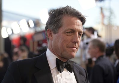 Hugh Grant arrives at the 23rd annual Screen Actors Guild Awards at the Shrine Auditorium & Expo Hall in Los Angeles, Sunday, January 29, 2023.