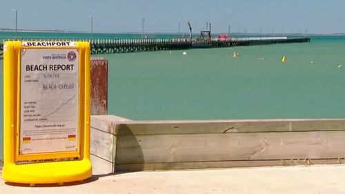 Locals say they have never seen a shark in the area, and the beach remains closed.