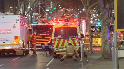 Russell Street was cordoned off as fire crews worked to extinguish the fire.