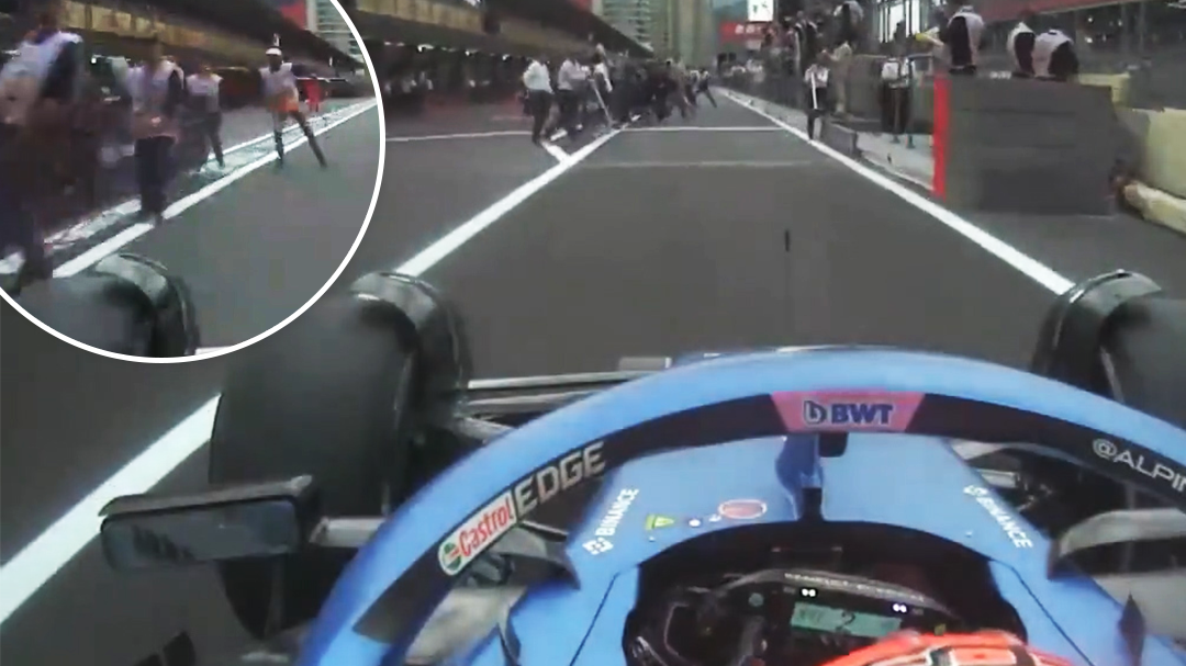 An onboard shot from Esteben Ocon shows the moment he entered a pit lane full of personnel at the Azerbaijan Grand Prix.