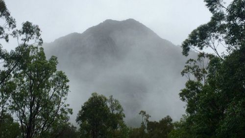 Rescuers have been unable to reach the hikers, who are stuck on Mount Beerwah. (9NEWS)