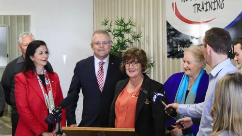 Millar (centre) with Scott Morrison.