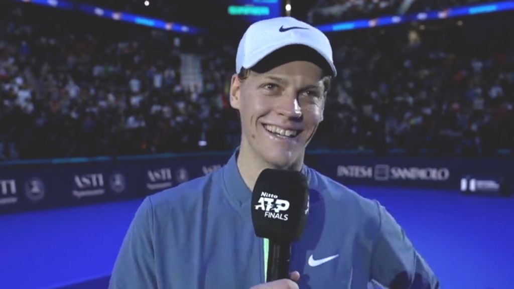 Jannik Sinner blushes while being serenaded by the ATP Finals crowd.