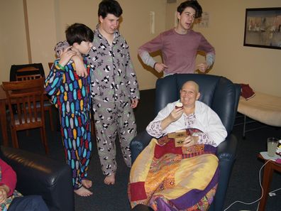 Jacob Boutcher with his mum Jodie, after her cancer diagnosis, and two elder brothers.