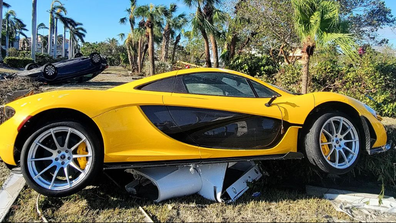 Floridians are waking to scenes of devastation after Hurricane Ian tore through the state with fury. Luxury car owner Ernie was horrified to find his  McLaren P1 supercar perched a top a toilet. 