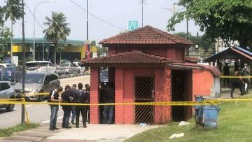 Malaysian police are investigating after a woman&#x27;s body was found in a travel bag. 