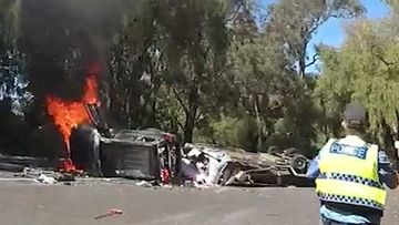 A couple have been pulled from the wreckage of their car just seconds before the vehicle exploded.Two Western Australia Police officers rushed towards the crashed car and caravan after the driver lost control at a bend along the South Western Highway near Harvey, in the state&#x27;s south-west, last month.