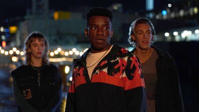 ONE OF US IS LYING -- "TBD" Episode 208 -- Pictured: (l-r) Jess McLeod as Janae, Chibuikem Uche as Cooper, Cooper van Grootel as Nate -- (Photo by: Matt Grace/PEACOCK)