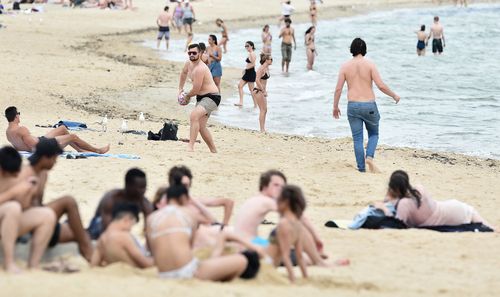 People heading to the beach are urged to swim between the flags following the drownings of two teenagers in the state this month. (AAP)