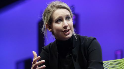 Holmes was featured in multiple media profiles as Theranos raised millions. (AP/AAP)
