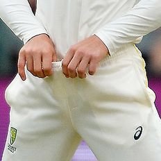 Cropped image of Cameron Bancroft tugging waistband (Getty)