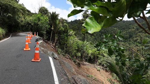 One of many huge slips on Mountain Rd, one of two access roads in Henderson Valley into Piha on February 14, 2023 in Auckland, New Zealand. New Zealand has declared a national state of emergency with flooding and landslides devastating several communities. (Photo by Fiona Goodall/Getty Images)