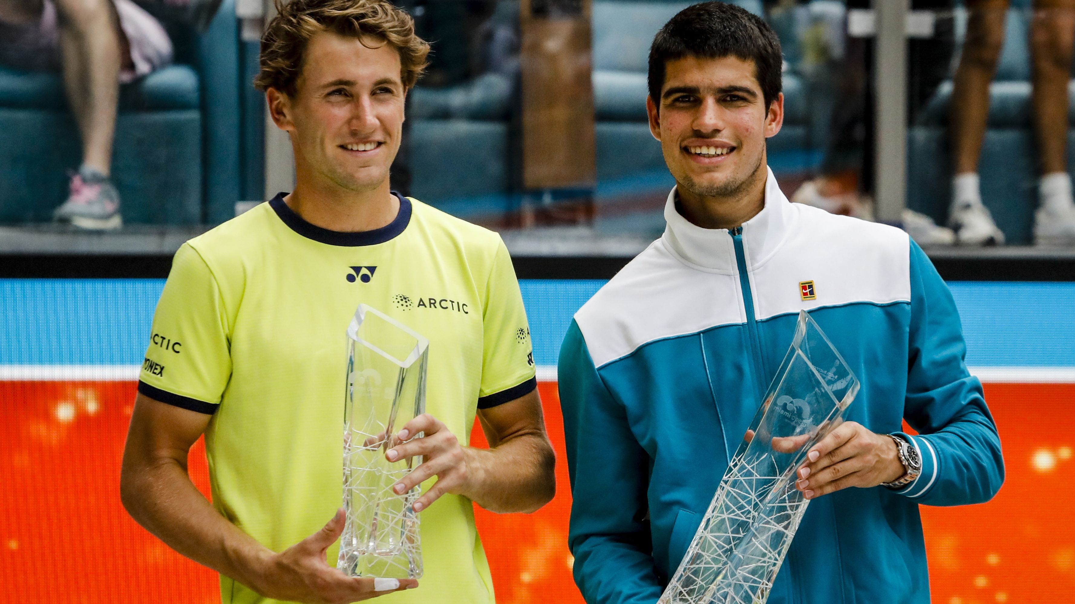 Carlos Alcaraz of Spain (right) and Casper Ruud of Norway hold their trophies after Men&#x27;s Singles final match at the Miami Open at Hard Rock Stadium on April 03, 2022 in Miami Gardens, Florida. (Photo by Eva Marie Uzcategui Trinkl/Anadolu Agency via Getty Images)